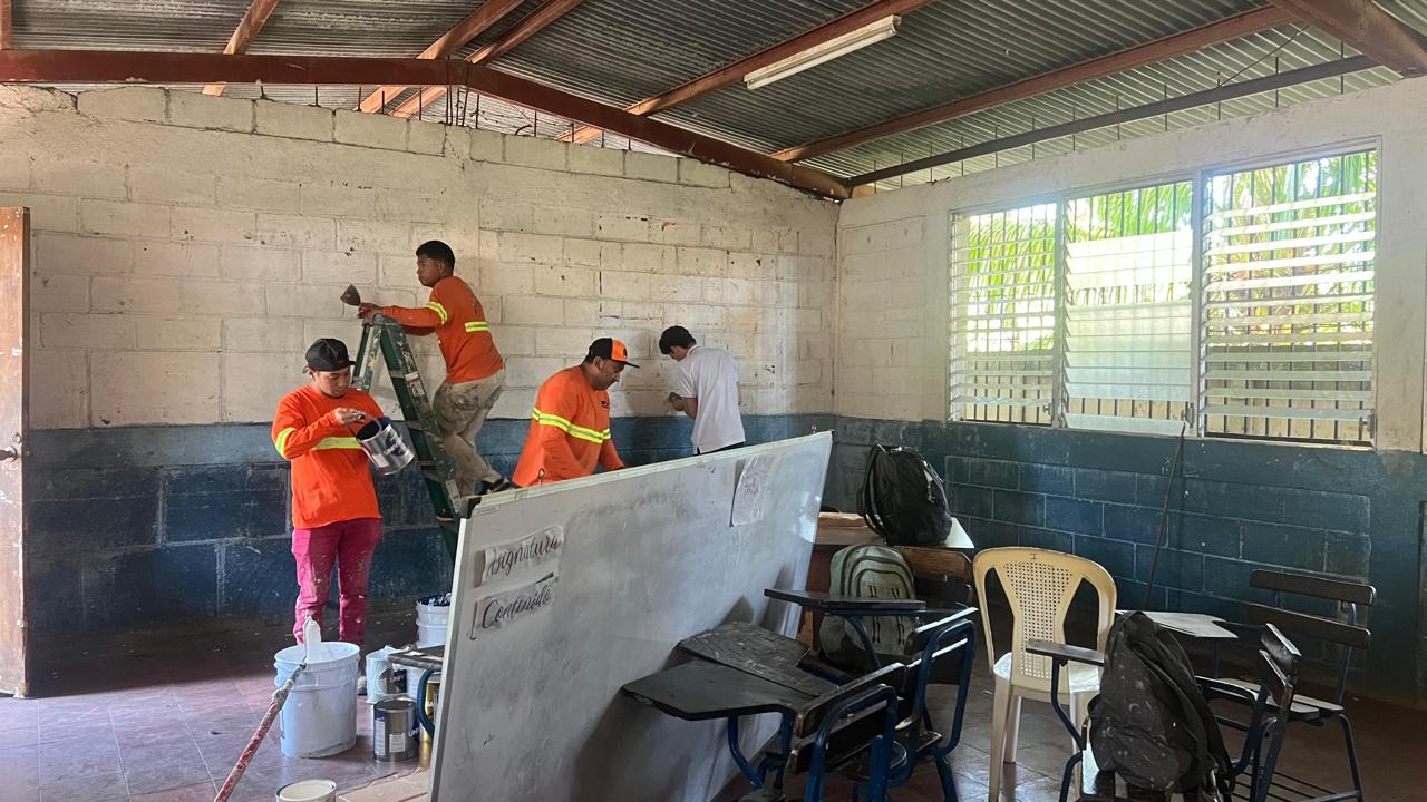 Painting behind-the-scenes work during the Engineers for Hope school transformation